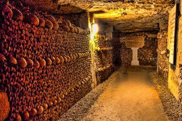 Hallway of the Catacombs, lined with skulls and bones.