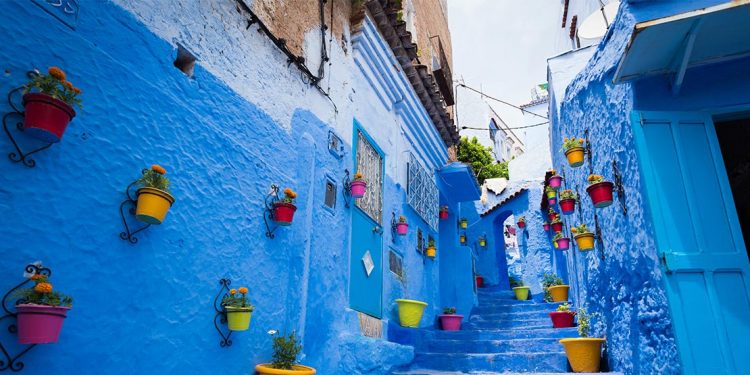 blue buildings on a street in Chefchaouen
