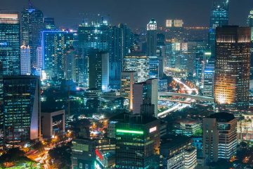 A night shot of Jakarta's downtown cityscape.