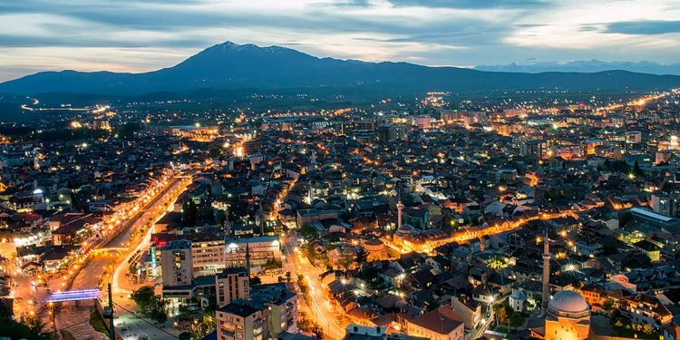 An evening cityline in one of Kosovo's towns