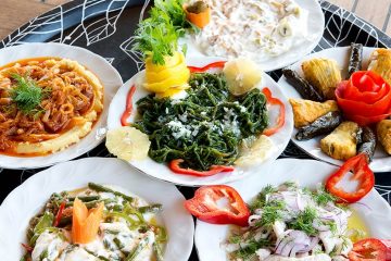 Large servings of traditional Turkish cuisine: kebabs, dolma, baklava, and Turkish delight