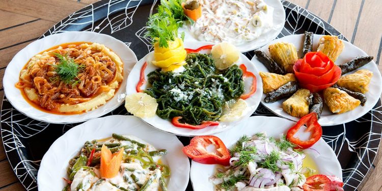 Large servings of traditional Turkish cuisine: kebabs, dolma, baklava, and Turkish delight