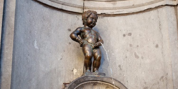 Close up of the small Manneken Pis statue in Brussels