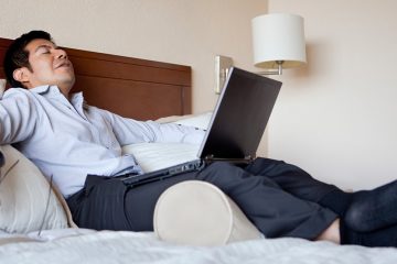 man relaxing after traveling all day