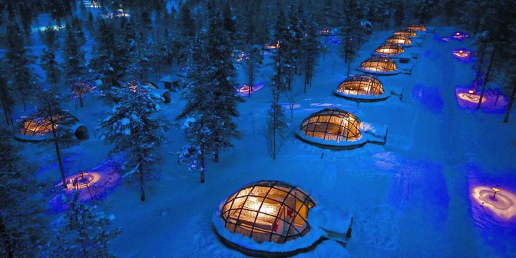 glass igloo style hotel rooms in snow