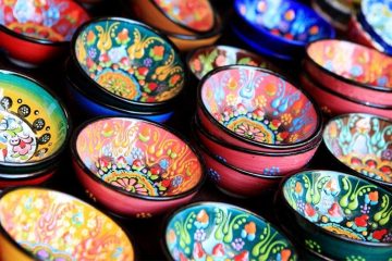 colorfully painted trinket dishes at a craft market