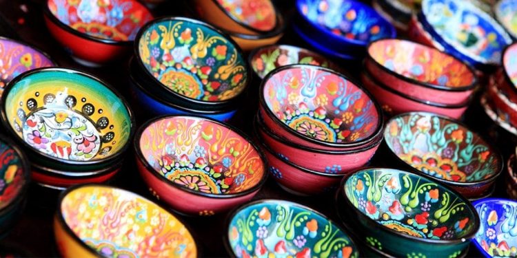 colorfully painted trinket dishes at a craft market