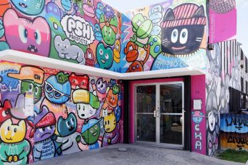 colorful street art and mural on a storefront