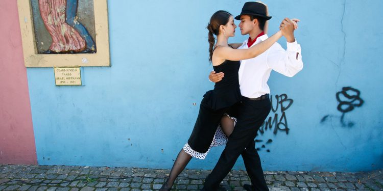 woman and man dance the tango