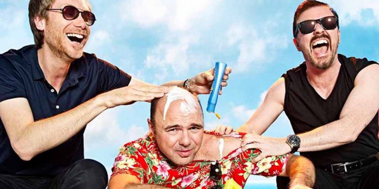 man rubbing sunscreen onto other man's head