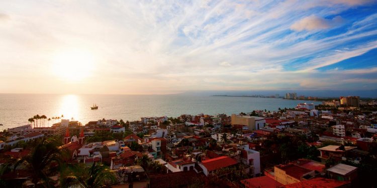 puerto vallarta, mexico overlooking the ocean as the sun starts to rise