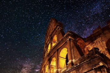 roman colosseum against starlit sky