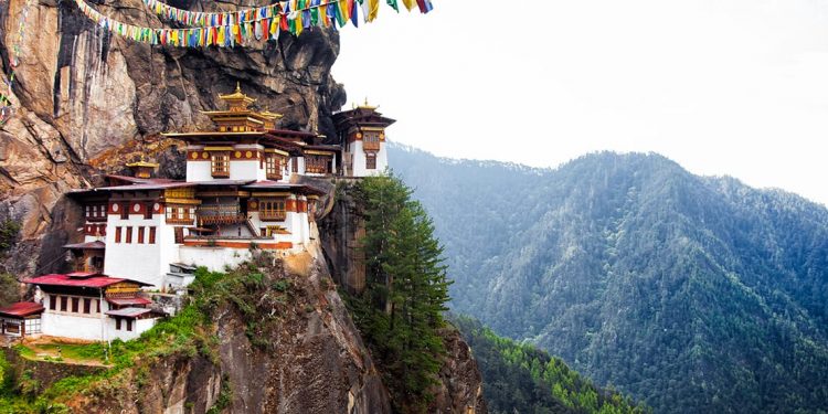 Dwellings built on the edge of a cliff in the Himalayas