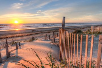 Sun sets over the beach in Outer Banks, North Carolina