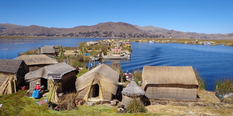 A small village continues its day-to-day living by the lake