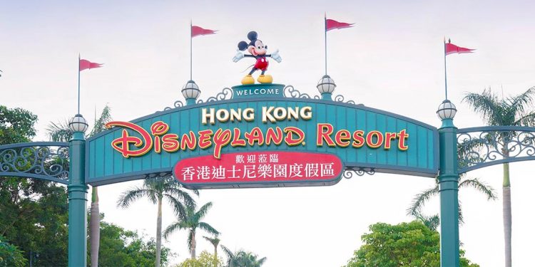 Green sign over the entrance of Hong Kong Disneyland Resort.