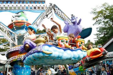 Kids on an amusement ride.