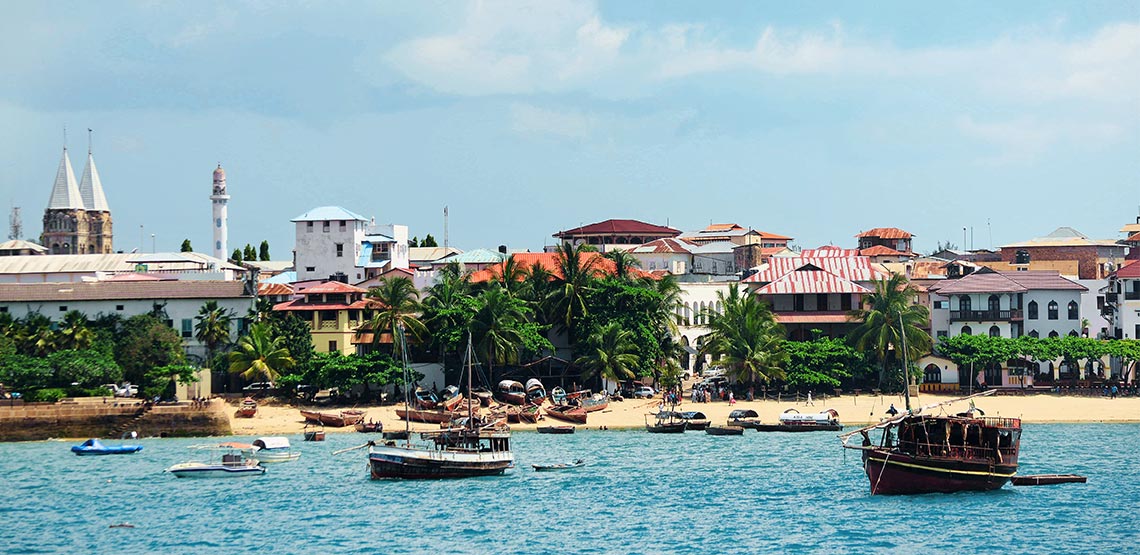 A view of Stone Town in Zanzibar from the ocean.