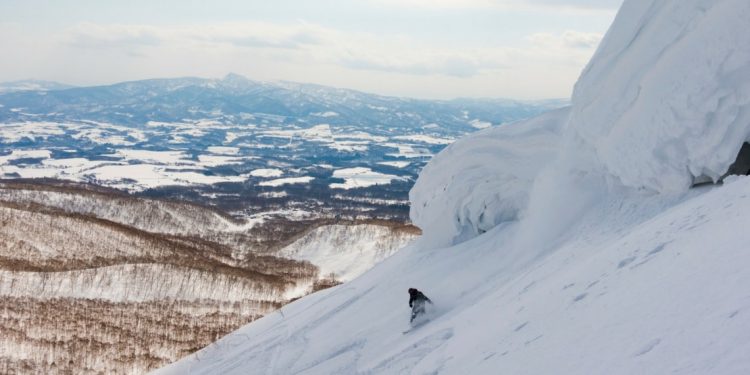 Person snowboarding in Japan