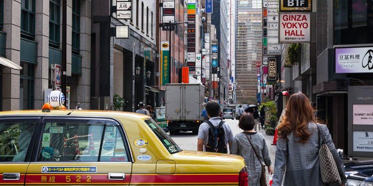 Pedestrians and a taxi in Ginza,Tokyo