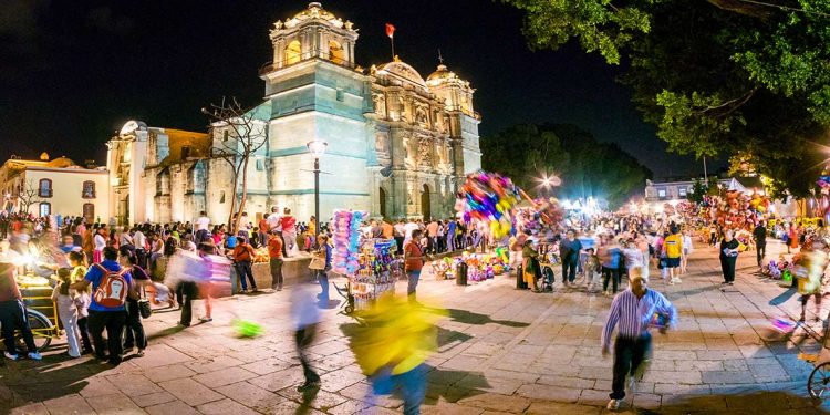 People in the streets of Oaxaca at night