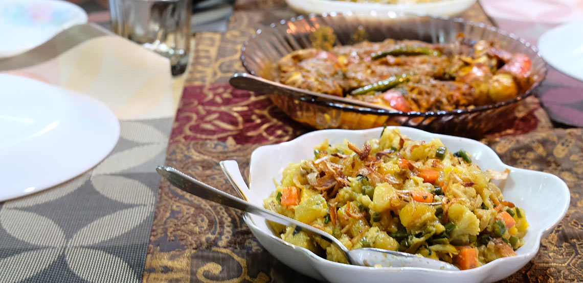 A plate of vegetable biryani.