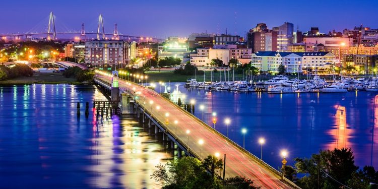 A Charleston, South Carolina skyline over the Ashley River viewed at night
