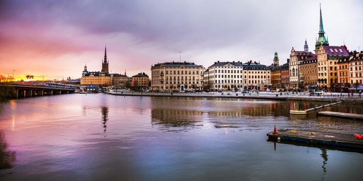Panorama of Stockholm's old town and church at dusk