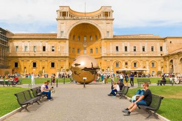 Giant orb sculpture in courtyard in Vatican City.