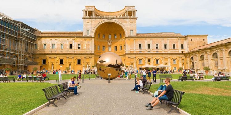 Giant orb sculpture in courtyard in Vatican City.