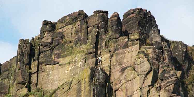 Someone rock climbing at The Roaches