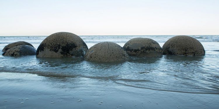 Spherical rocks in water