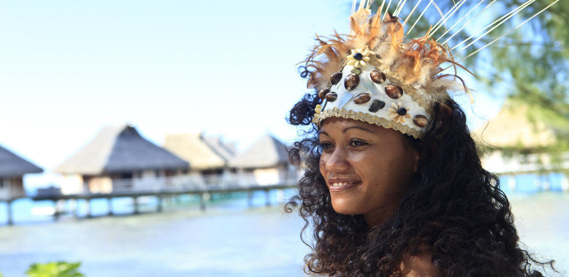 A dancer in traditional dress in Tahiti