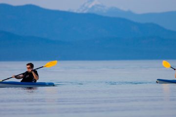 Two people kayaking of coast of Vancouver Island