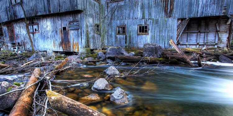 Water running by an old mill