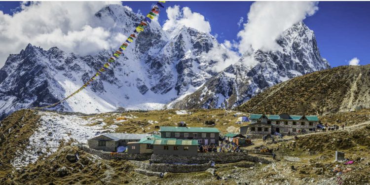 prayer flags and tents at everest base camp