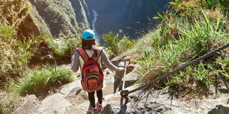 Woman hikes Inca Trail in Peru