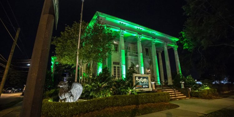 Exterior of The Mortuary, lit up green