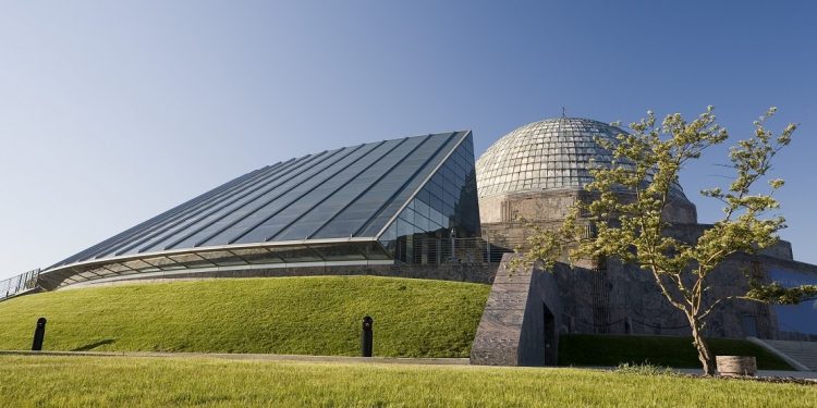 A view of Adler Planetarium in Chicago, Illinois, on a cloudless day