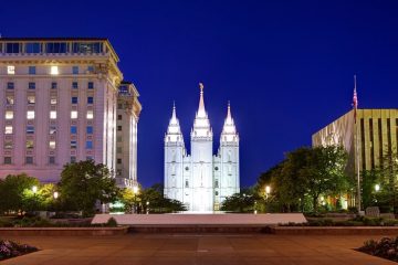 Temple Square in Downtown Salt Lake City at nigh with the Temple bathed in light