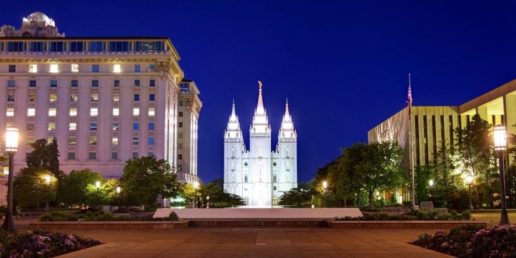 Temple Square in Downtown Salt Lake City at nigh with the Temple bathed in light
