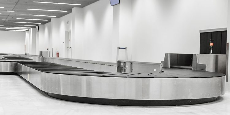 Empty luggage conveyor at the airport