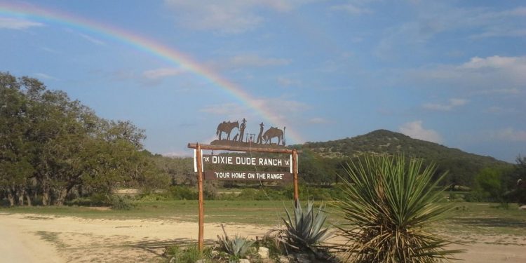 entrance sign for Dixie Dude Ranch