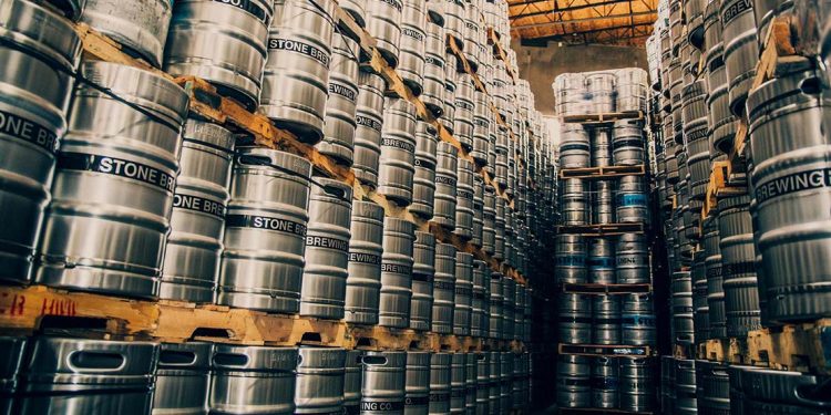 Stacks of silver barrels of beer