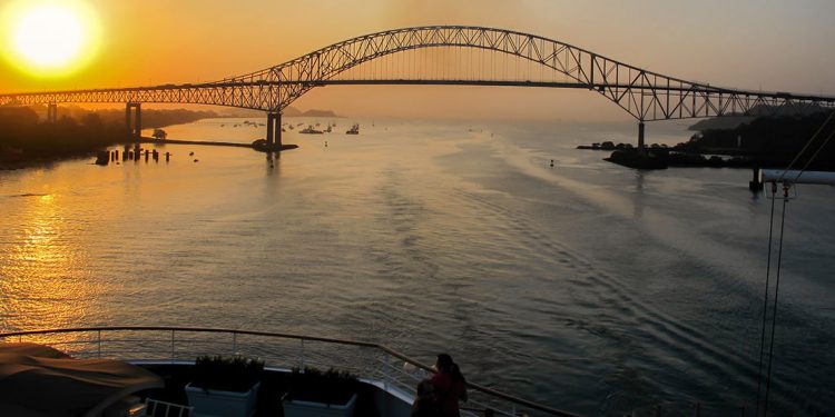 Bridge of the Americas over the Panama Canal at sunrise