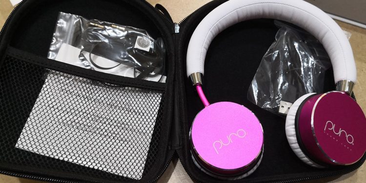 Pink headphones in an open case