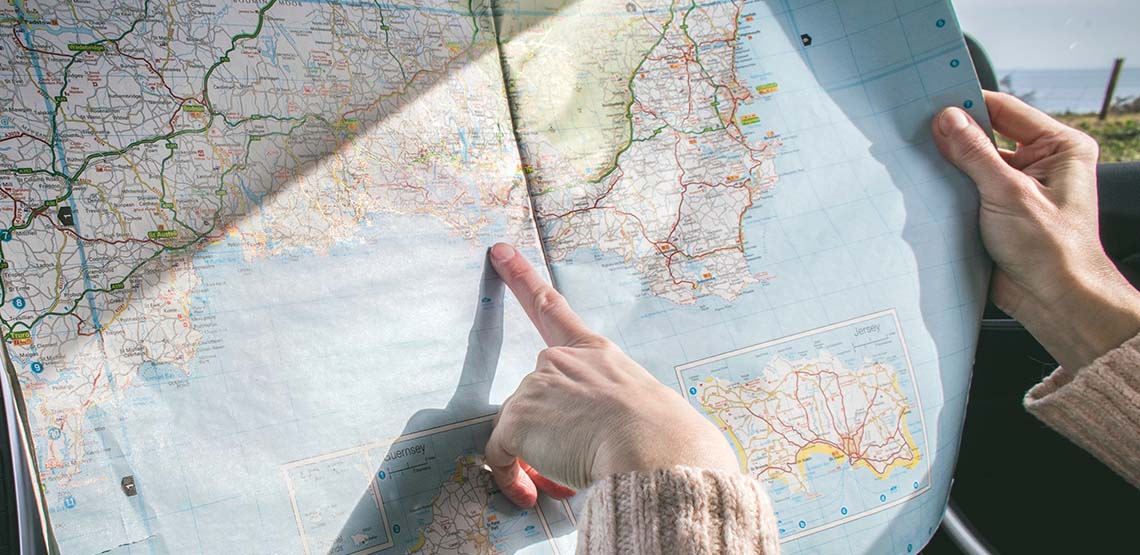 Someone pointing at a map.