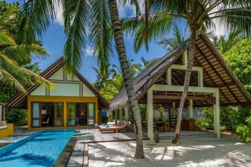 A pool villa on the Four Seasons Maldives island.