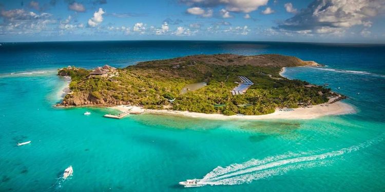 An overhead view of Necker Island surrounded by turquoise waters.