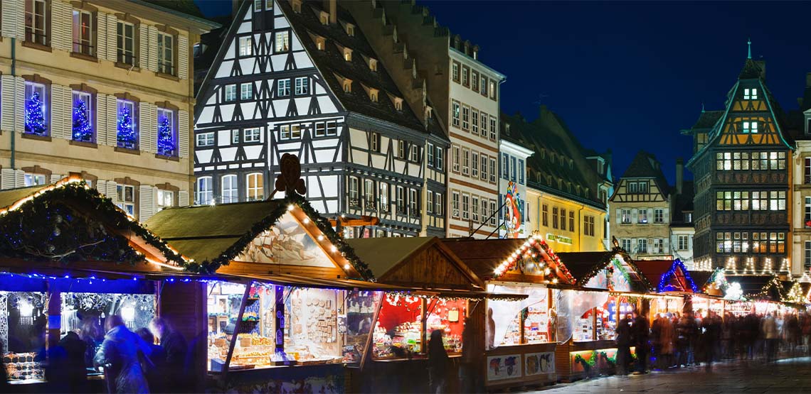 Strasbourg Christmas Markets lit up at night in France.